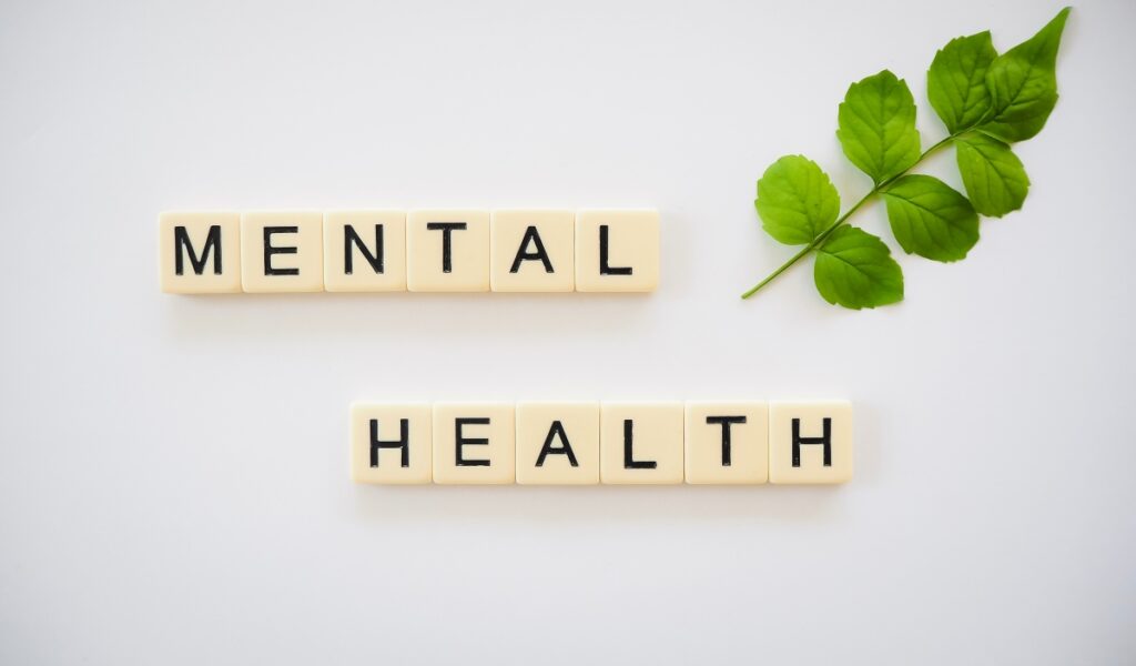 Scrabble letters depicting the words “mental health”