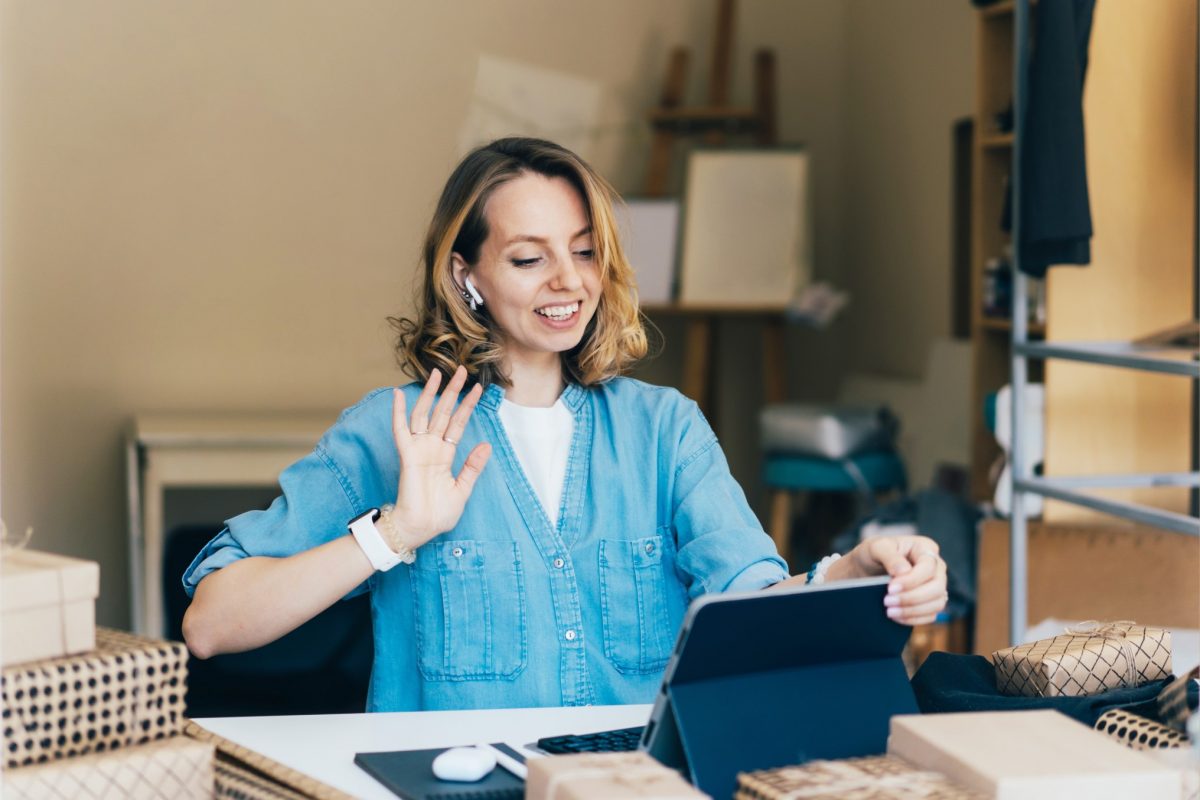 young woman engaging in second interview through video interview