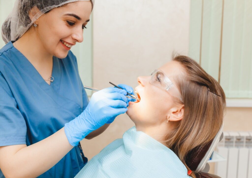 dentist woman checking up client