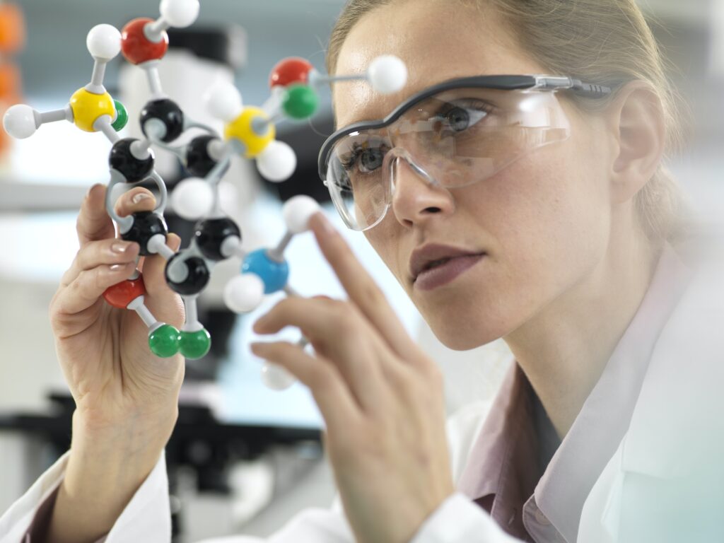 Scientist preparing a sample in a vial ready for analysis in the laboratory